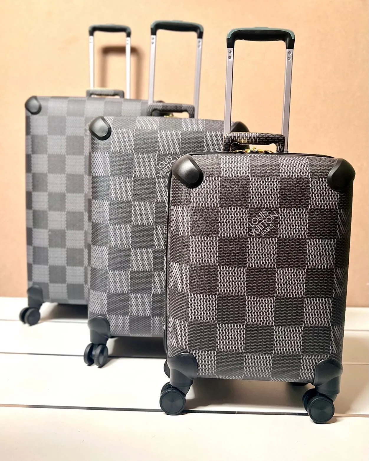 Louis Vuitton Damier-style checker hardside luggage set