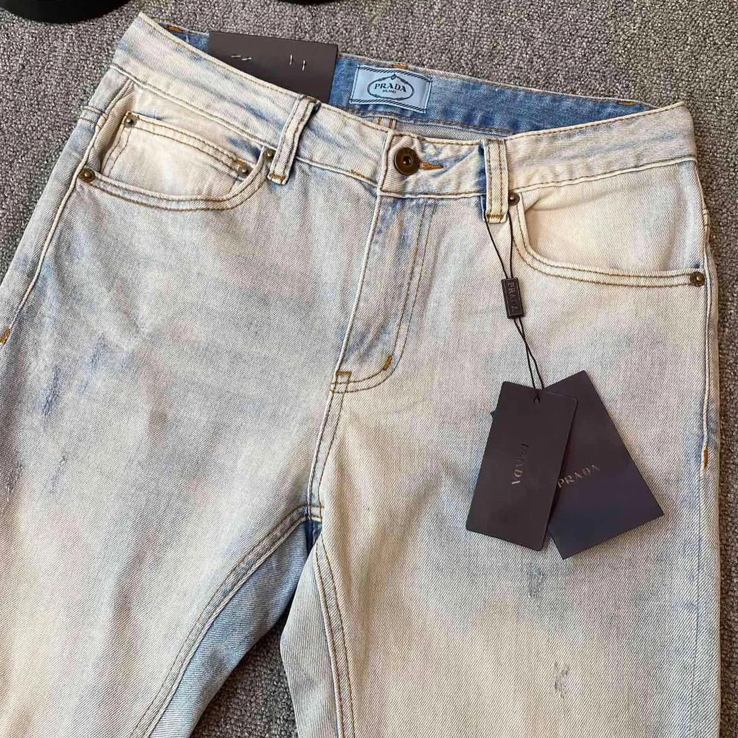 Prada triangle-logo denim jeans