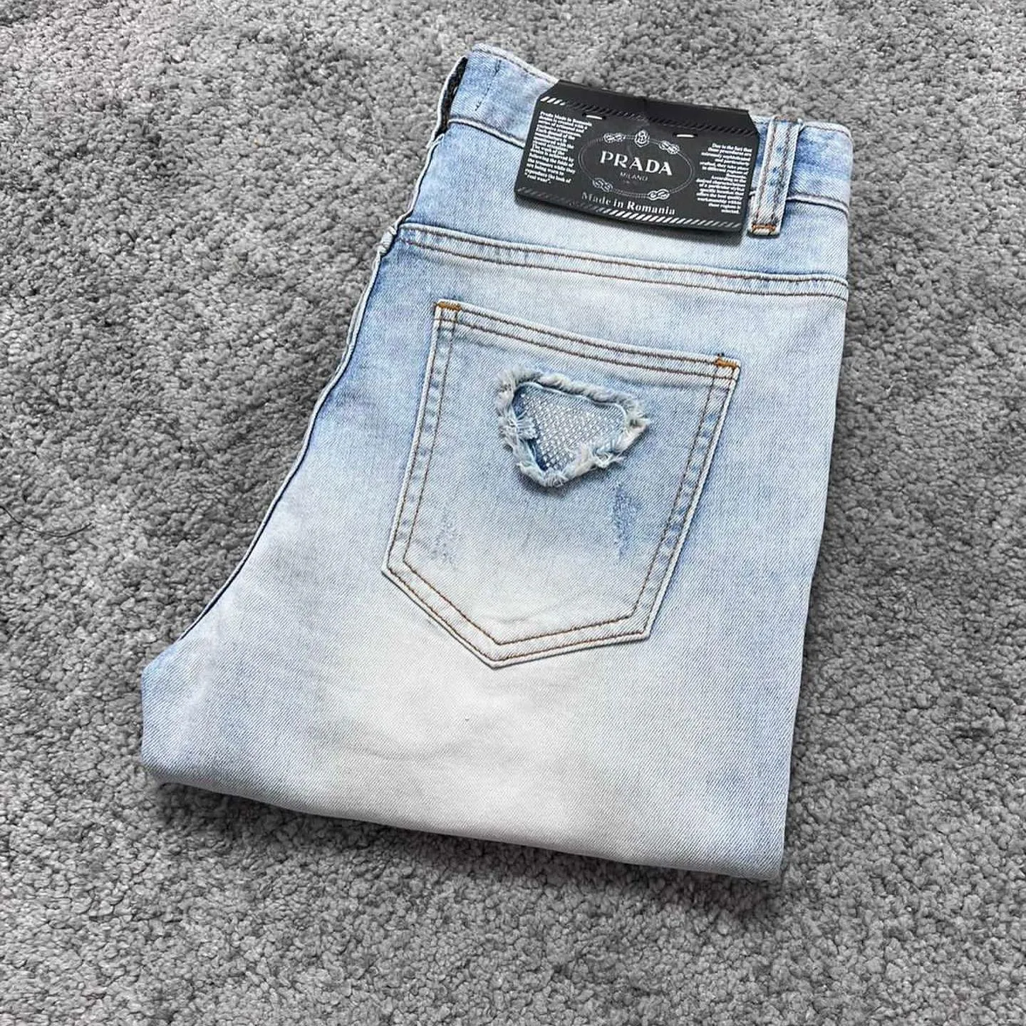 Prada triangle-logo denim jeans photo 7