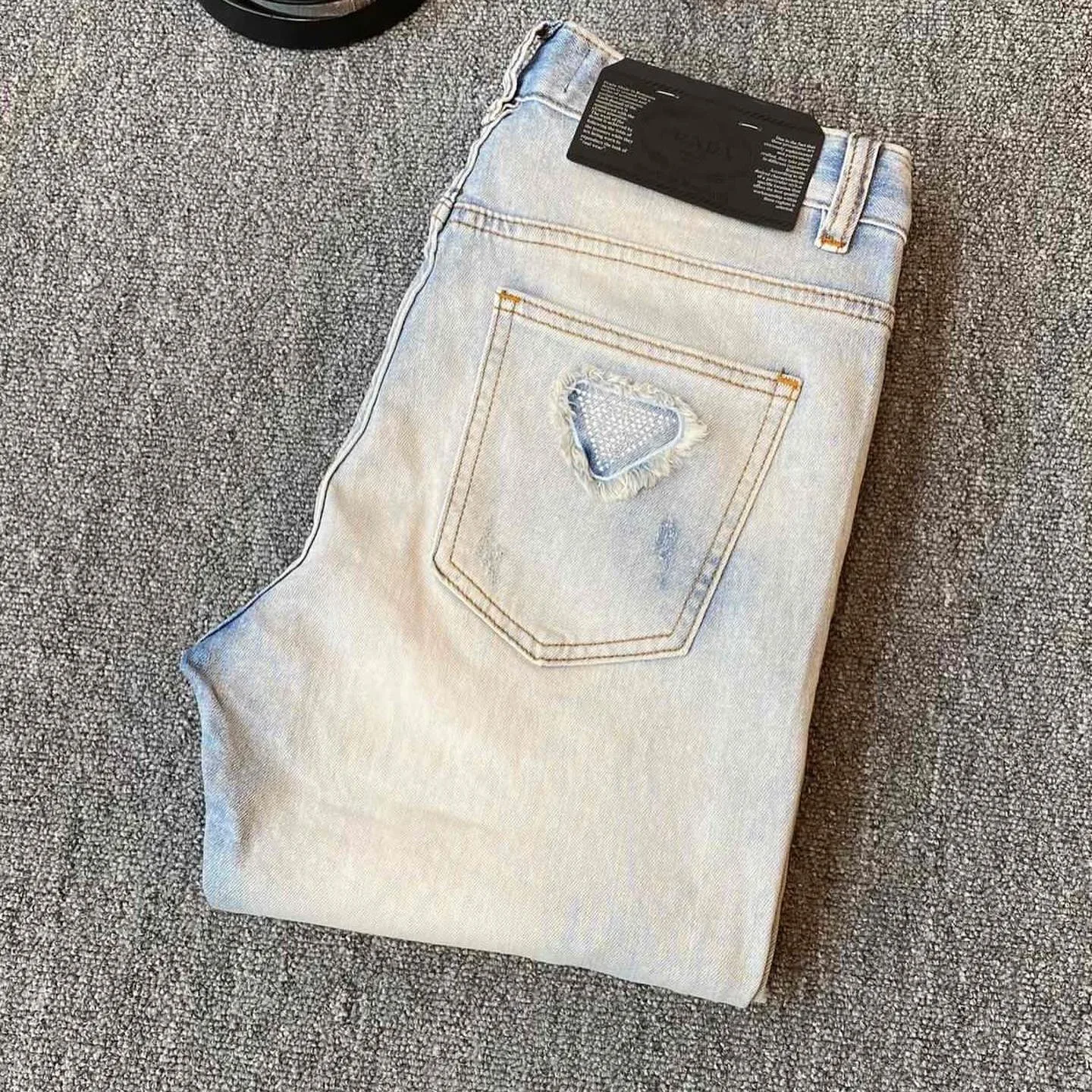 Prada triangle-logo denim jeans photo 5