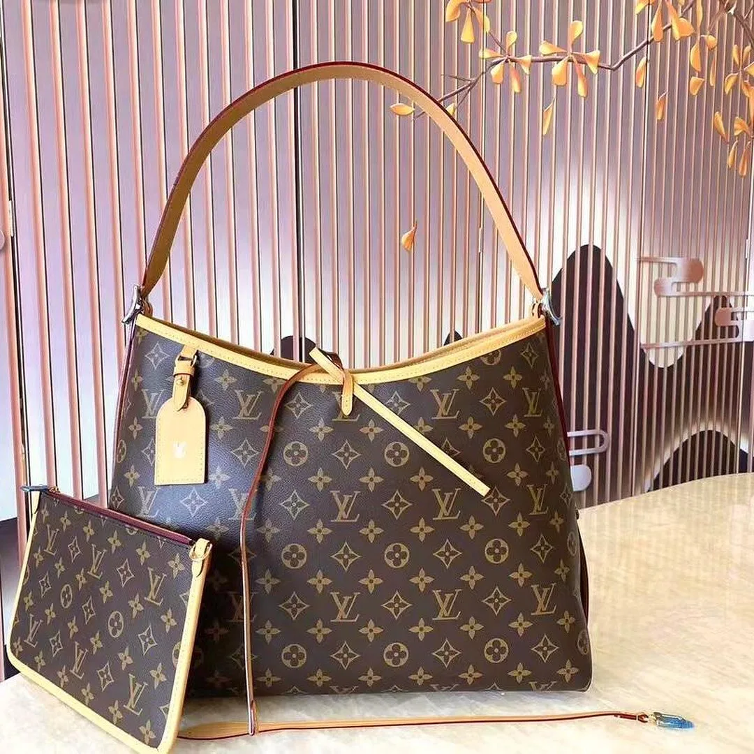Louis Vuitton CarryAll photo 2